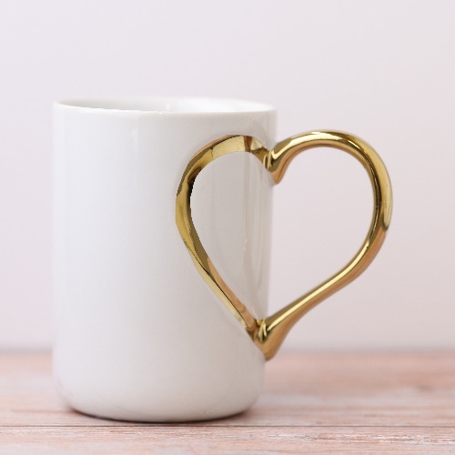 WHITE MUG WITH GOLD HEART HANDLE