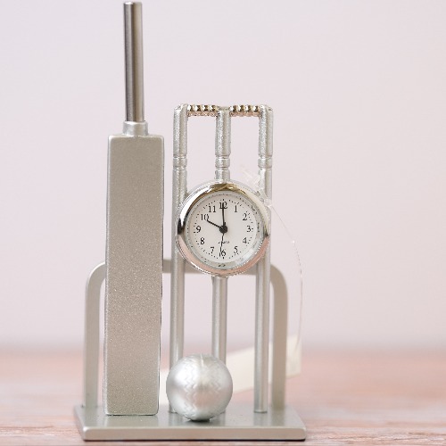 cricket bat ball and wicket clock