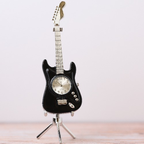 black guitar clock